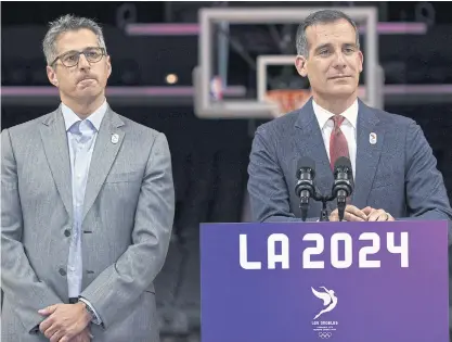  ??  ?? Los Angeles Mayor Eric Garcetti, right, and LA 2024 chairman Casey Wasserman.