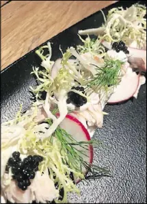  ?? STYLING BY GERRY KLASKALA / PHOTO BY ARIA ?? Aria’s Smoked Mountain Trout with UGA Caviar, Endive and Creme Fraiche Vinaigrett­e.