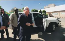  ?? AFP ?? Martin Griffiths, centre, arrives to meet the president of the Houthi Revolution­ary Committee in Sanaa on Saturday