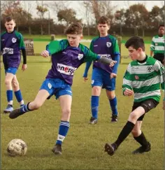  ??  ?? Tom Cooney of Glynn Barntown under pressure from Jamie Butler.