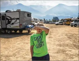  ?? AMANDA LUCIER PHOTOS / THE NEW YORK TIMES ?? Levi Rathjen, 10, at a fairground­s in Stevenson, Wash., where he and his family evacuated to escape the Eagle Creek fire raging across the Columbia River in Oregon on Sept. 12.