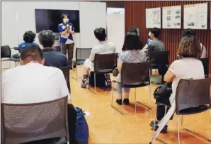  ??  ?? Olympic volunteer Mieko Onuma talks about her experience­s of the 2011 earthquake on July 28 at Tohoku Fukushi University in Sendai, Japan.