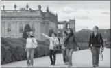  ?? IAN DAISLEY / FOR CHINA DAILY ?? Chinese visitors tour the grounds of Chatsworth House in Derbyshire, the stately home and seat of the Duke of Devonshire.