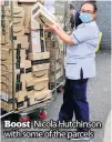  ??  ?? Boost Nicola Hutchinson with some of the parcels
