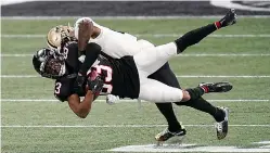  ?? AP Photo/Brynn Anderson ?? ■ New Orleans Saints strong safety Malcolm Jenkins (27) hits Atlanta Falcons wide receiver Russell Gage (83) during the first half of an NFL football game Sunday in Atlanta.