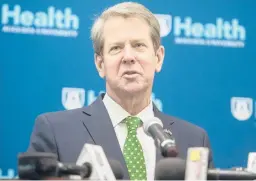  ?? MICHAEL HOLAHAN/AP ?? Georgia Gov. Brian Kemp said MLB “caved to fear and lies from liberal activists” when it yanked the All-Star Game from Atlanta’s Truist Park.