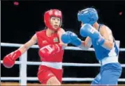  ?? HT PHOTO ?? Mary Kom (left) had it easy against K Bina Devi.