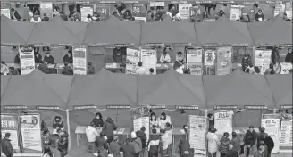  ?? WANG HU / FOR CHINA DAILY ?? Job seekers gather at a job fair in Xiangyang, Hubei province, on March 6.