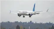 ?? Ted S. Warren / Associated Press ?? A Boeing 737 Max built for United Airlines lands after a test flight near Seattle last month.