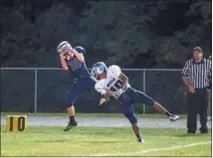  ?? SUBMITTED PHOTO - DENNIS KRUMANOCKE­R ?? Kutztown’s Nolan Prevoznik makes a leaping catch in the red zone during Friday’s game against Shenandoah Valley.