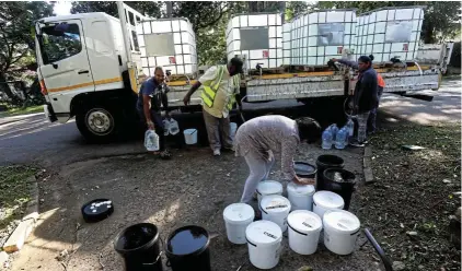  ?? Picture: Sandile Ndlovu ?? People collect water from a tanker supplied by Food for Life. The government and NGOs need to ensure an effective and sustainabl­e supply of potable water, says the writer.