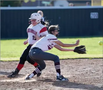  ?? Bud Sullins/Special to the Herald-Leader ?? Siloam Springs shortstop Kenlie Noel takes the throw at second base as Russellvil­le’s Hannah Rickman tries to steal the base on Monday at La-Z-Boy Park. Russellvil­le defeated Siloam Springs 10-0 in the 5A/6A District 1 game.