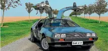  ??  ?? It’s got plenty of ‘‘show’’, just not so much ‘‘go’’. The DeLorean DMC-12 makes a better time machine than a wedding car.