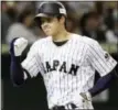  ?? KOJI SASAHARA — ASSOCIATED PRESS FILE ?? Japan’s Shohei Ohtani reacts after hitting a solo home run against the Netherland­s at Tokyo Dome in Tokyo.