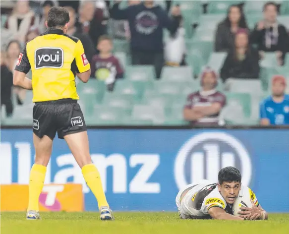  ?? Picture: AAP IMAGE ?? Penrith’s Tyrone Peachey scored a controvers­ial try against Manly in which on-field officials deemed that his hand didn’t touch the ball.