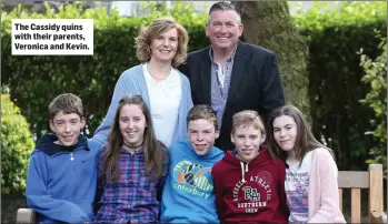  ??  ?? The Cassidy quins with their parents, Veronica and Kevin.