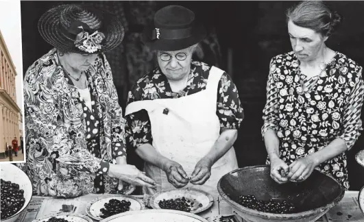  ??  ?? Humble roots: Members prepare cherries to make jam in 1943. The Women’s Institute recently celebrated its centenary