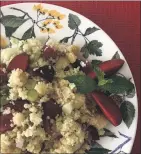  ?? PHOTO BY CATHY THOMAS ?? Couscous with plumcots (or plums) and mint is a salad that can stand on its own or be a side dish for grilled pork or lamb.