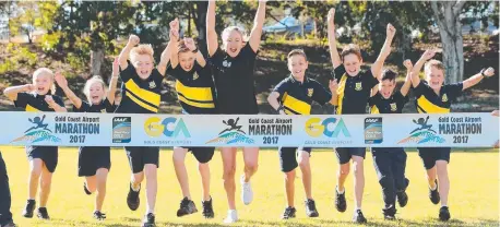  ??  ?? Ashmore State School students have a training session with Olympian Benita Willis. Picture: GLENN HAMPSON