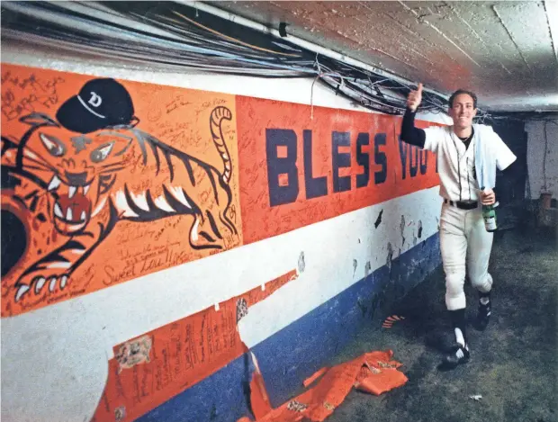  ??  ?? Above, Trammell sports a wide grin in the tunnel leading from the field to the Tigers’ clubhouse after winning the World Series in October 1984 at Tiger Stadium in Detroit.