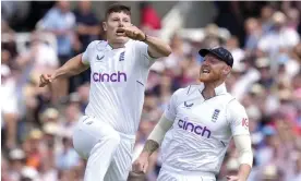  ?? Williamson. Photograph: Kirsty Wiggleswor­th/AP ?? Matt Potts (left) and Ben Stokes celebrate the early wicket of New Zealand's captain Kane