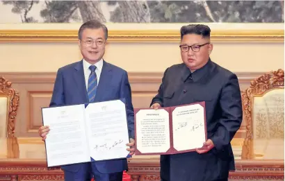  ?? AFP ?? south Korean President moon Jae-in and North Korean leader Kim Jong-un during a signing ceremony after their summit at Paekhwawon state Guesthouse in Pyongyang on wednesday. —