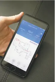  ?? Liz Hafalia / The Chronicle ?? Ecovacs Robotics’ app displays the programmed route a robot vacuum uses in cleaning floors.