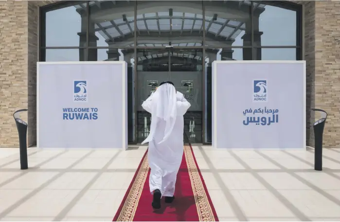  ?? Bloomberg ?? The entrance to the Ruwais refinery and petrochemi­cal complex in Al Dhafra region that is operated by Adnoc