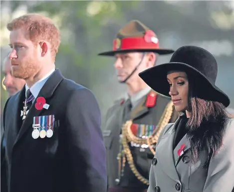  ??  ?? PRINCE Harry has led the nation in honouring Australia and New Zealand’s war dead at a poignant dawn service commemorat­ing Anzac Day.
Harry was joined by fiancee Meghan Markle for the early-morning event at the New Zealand war memorial where thousands...