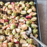  ??  ?? Roasted Brussels sprouts with apples and bacon