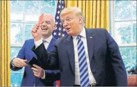  ?? REUTERS ?? No Red Card for rhetoric? US President Donald Trump with FIFA president Gianni Infantino.