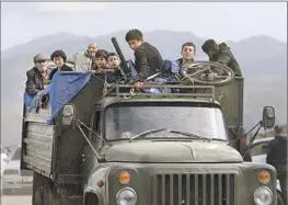  ?? Stepan Poghosyan Photolure ?? ETHNIC ARMENIANS on Sept. 26 flee Azerbaijan’s offensive to recapture the Nagorno-Karabakh region that experts say was mounted using Israeli weapons.