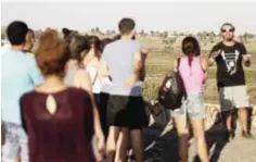  ??  ?? A group of tourists visit a former Syrian army post in Quneitra, in the Israeli-annexed Golan Heights.