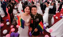  ?? COMERCIO.COM ?? Lesbianas se casaron en las Fuerzas Armadas de Taiwán.