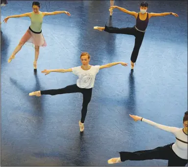  ?? ?? Salenko (center) trains with other dancers.