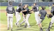  ?? ?? Miami Springs baseball players celebrate after rallying to beat Columbus 3-2 in a GMAC semifinal at the Explorers’ home field on Tuesday night.