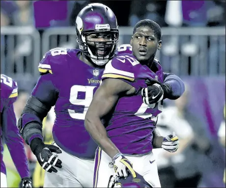  ?? GETTY IMAGES ?? Vikings defensive back Xavier Rhodes (right) dodged a tricky question from Don Brennan after Sunday’s thrilling game.