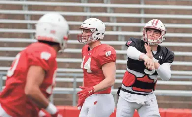  ?? RICK WOOD / MILWAUKEE JOURNAL SENTINEL ?? Under normal circumstan­ces, quarterbac­k Graham Mertz and the Badgers would be about halfway through spring practice.