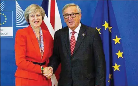  ??  ?? Prime Minister, Theresa May (left), and European Union President, Jean-Claude Juncker, after a meeting at the EU headquarte­rs in Brussels…yesterday