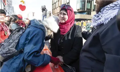  ??  ?? Those left to pick up the pieces after last year’s terrorist attacks in Christchur­ch were mostly women Photograph: Martin Hunter/AAP