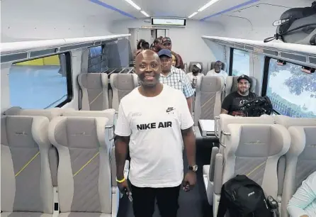  ?? MIKE STOCKER/SOUTH FLORIDA SUN SENTINEL ?? Thomas Raynard James gets ready to ride the Brightline train to Miami to watch the Heat game on Wednesday. Last week, a Miami judge vacated the life sentence of James, whom prosecutor­s said was wrongfully convicted in 1991.