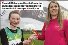  ??  ?? Niamh O’Mahony, An Ríocht AC, won the 5K road race on Sunday and is pictured here with club manager, Hazel Byrne