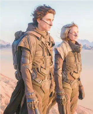  ?? CHIA BELLA JAMES WARNER BROS. ENTERTAINM­ENT ?? Timothée Chalamet and Rebecca Ferguson in a scene from the upcoming 2021 film “Dune.”