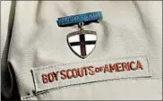  ?? TONY GUTIERREZ/AP 2013 ?? The Boy Scouts of America is suffering financiall­y from sex-abuse litigation and declining membership.