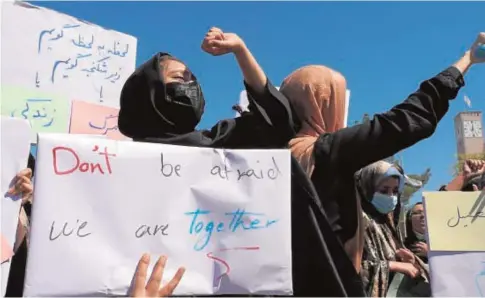  ?? // AFP ?? Entre las pancartas, se podía leer alguna en la que animaban a las mujeres a «no tener miedo. Estamos unidas»