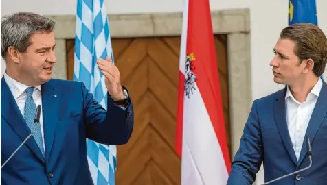  ?? Foto: Peter Kneffel, dpa ?? Bayern trifft Österreich, Ministerpr­äsident trifft Bundeskanz­ler, Markus Söder trifft Sebastian Kurz: Bei der ersten gemeinsame­n Kabinettss­itzung tauschten sich die Politiker vor allem über das Thema Asyl aus – und waren in weiten Teilen ähnlicher...