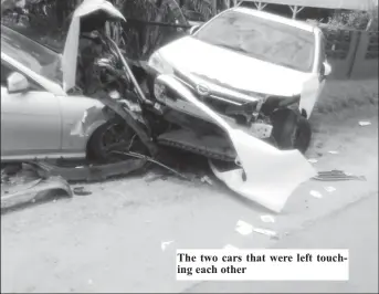  ?? ?? The two cars that were left touching each other