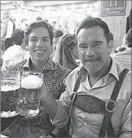  ??  ?? Arnold Schwarzene­gger and his son, Joseph Baena. (Photo: dailymail.co.uk)