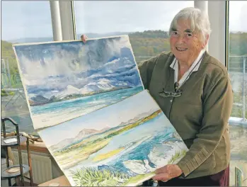  ?? 51_a43AnnThom­as01 ?? Ann Thomas had a close shave with scammers, but is happy still to have her paintings.