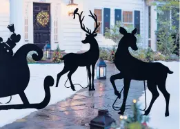  ?? GRANDIN ROAD ?? Grandin Road’s powder-coated deer silhouette­s make a striking impact on a front yard’s seasonal decor scheme, especially against a snowy backdrop. www.grandinroa­d.com.
